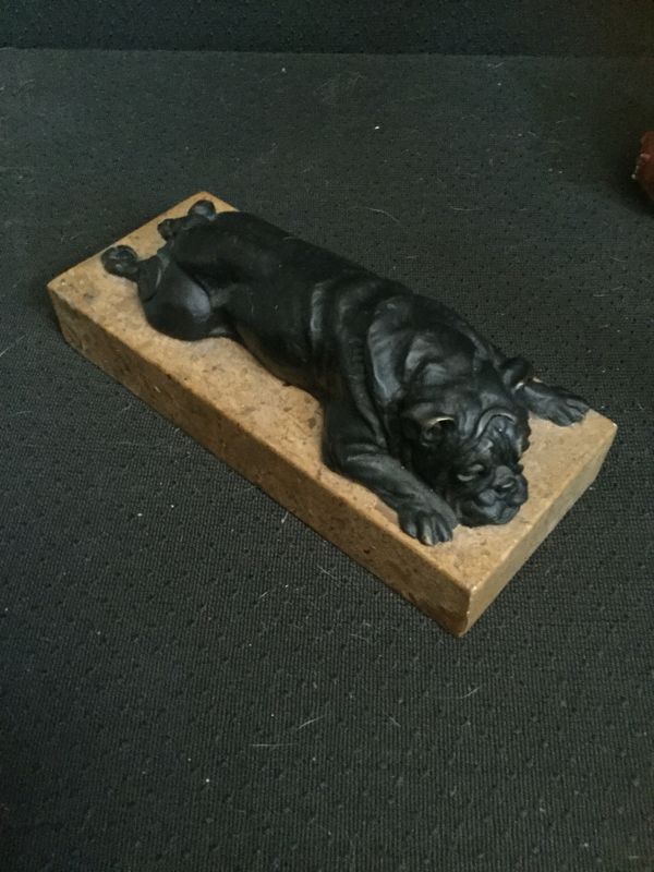 Famous Doris Linder lying bulldog in bronze