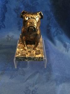 Bulldogs on display a museum taster 12 Metal seated bulldog on marble base