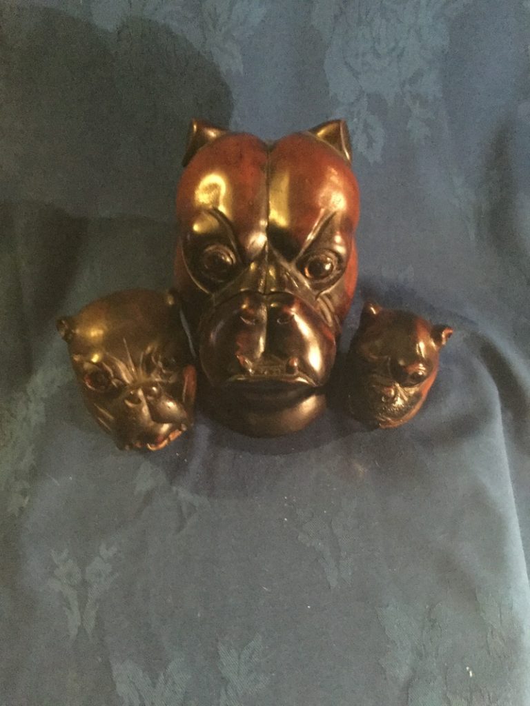 Treen bulldog head pieces