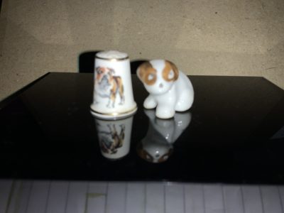 Amazing thimble sized bulldog statuettes 