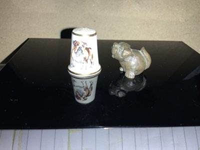 Amazing thimble sized bulldog statuettes