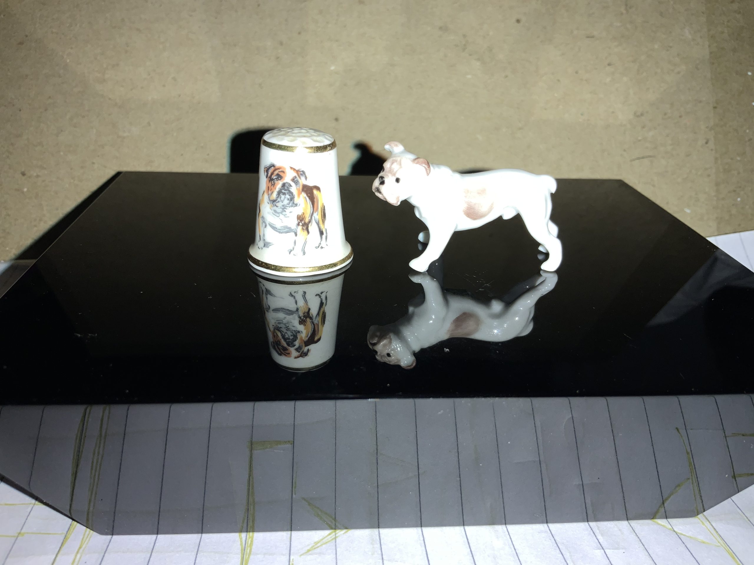 Amazing thimble sized bulldog statuettes