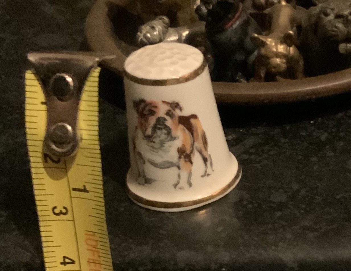 Amazing thimble sized bulldog statuettes 