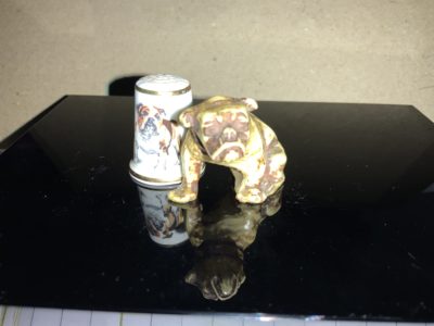 Amazing thimble sized bulldog statuettes 